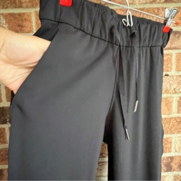 Lululemon  * On The Fly Pant Black Designed for: Office Travel Commute EUC 26” - Picture 11 of 16